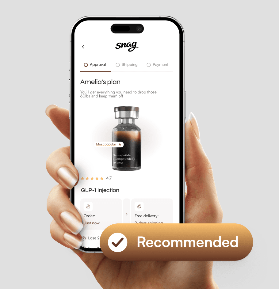 A hand holding a smartphone against a neutral gray background, displaying a mobile health app interface. The screen shows a personalized plan titled Amelia's plan for a GLP-1 injection, featuring a 3D render of a medical vial with the SnagRx logo. Above the phone, a large teal floating button with a white checkmark icon reads Recommended. The UI design is minimalist with teal accents and includes progress indicators for Approval, Shipping, and Payment.
