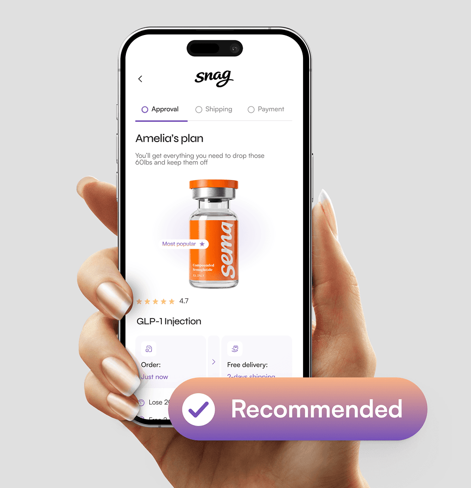 A hand holding a smartphone against a neutral gray background, displaying a mobile health app interface. The screen shows a personalized plan titled Amelia's plan for a GLP-1 injection, featuring a 3D render of a medical vial with the SnagRx logo. Above the phone, a large teal floating button with a white checkmark icon reads Recommended. The UI design is minimalist with teal accents and includes progress indicators for Approval, Shipping, and Payment.